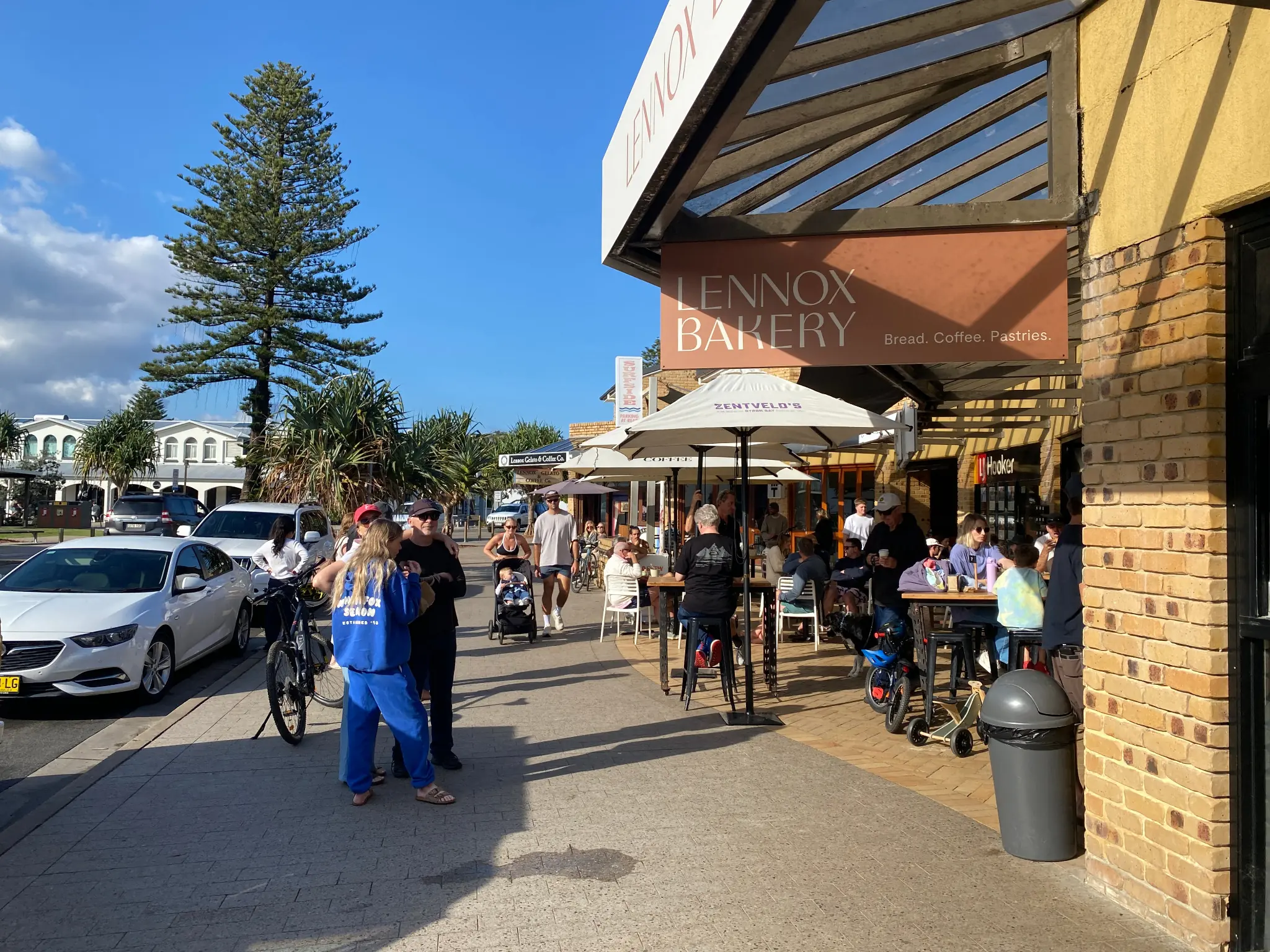 A busy café and footpath in the centre of Lennox Head